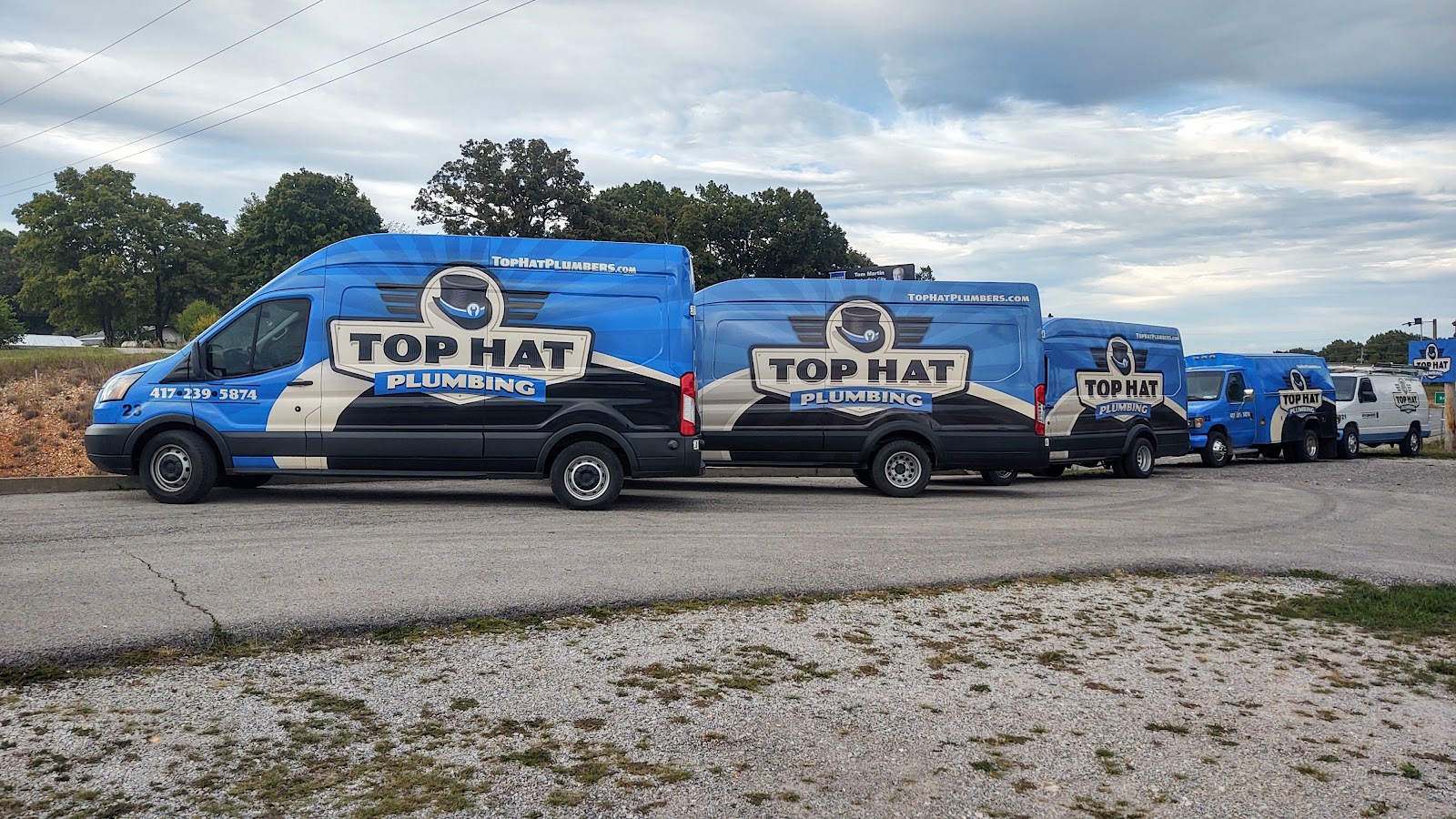 Fleet of Top Hat Plumbing vans