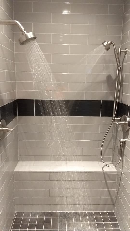 Installed shower with dual showerheads